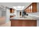 Kitchen boasts granite countertops and modern cabinetry at 2733 Glenview Dr, Land O Lakes, FL 34639