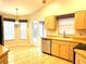 Kitchen features an eat-in area and sliding glass doors to patio at 286 Royal Palm Way, Spring Hill, FL 34608