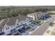 Aerial perspective of townhomes and street at 30822 Veridian Way, Wesley Chapel, FL 33543