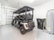 Garage with golf cart and extra storage space at 30822 Veridian Way, Wesley Chapel, FL 33543