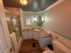 Well-maintained bathroom with a shower, vanity, and good lighting at 3301 Alt 19 # 126, Palm Harbor, FL 34683