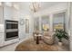 Kitchen breakfast nook with two armchairs and a decorative rug at 33843 Galley Way, Wesley Chapel, FL 33543