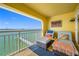 Enjoy water views from this relaxing balcony with comfortable lounge chairs at 370 8Th N Ave # 7, Tierra Verde, FL 33715