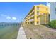 Building exterior, showcasing waterfront location and building features at 370 8Th N Ave # 7, Tierra Verde, FL 33715