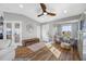 Bright living room with hardwood floors and bay window at 370 8Th N Ave # 7, Tierra Verde, FL 33715