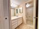 Bright bathroom features a vanity, toilet and bathtub at 4210 Ironwood Cir # 403J, Bradenton, FL 34209