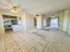 Open living room and kitchen with tile floors at 4210 Ironwood Cir # 403J, Bradenton, FL 34209