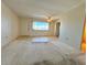 Living room with tiled floors and window view at 4210 Ironwood Cir # 403J, Bradenton, FL 34209