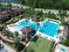 Resort-style pool with lap lanes, water slide, and lounge area at 4761 San Martino Dr, Wesley Chapel, FL 33543