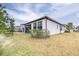 Single-Gathering home with screened porch and well-manicured lawn at 4761 San Martino Dr, Wesley Chapel, FL 33543