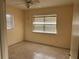 Bright bedroom with neutral walls and window blinds at 5163 Jasmine Cir, St Petersburg, FL 33714