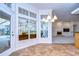 Bright breakfast area with French doors leading to the pool at 5823 Audubon Manor Blvd, Lithia, FL 33547