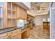 Bright kitchen featuring ample cabinetry and granite countertops at 5823 Audubon Manor Blvd, Lithia, FL 33547