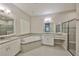 Elegant bathroom featuring a large soaking tub and walk-in shower at 6321 Voyagers Pl, Apollo Beach, FL 33572