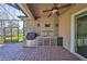 Outdoor kitchen features stainless steel appliances and stonework at 6321 Voyagers Pl, Apollo Beach, FL 33572