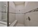 Large walk-in shower with built-in seat and tiled walls at 6321 Voyagers Pl, Apollo Beach, FL 33572