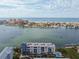 Aerial view showcasing waterfront location and building at 644 Island Way # 206, Clearwater, FL 33767