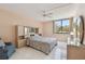 Spacious bedroom with large window and built-in shelving at 644 Island Way # 206, Clearwater, FL 33767