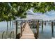 Wooden walkway leads to boat slips at 644 Island Way # 206, Clearwater, FL 33767