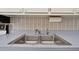 Clean stainless steel double sink in the kitchen at 644 Island Way # 206, Clearwater, FL 33767