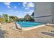 Inviting community pool with surrounding patio at 644 Island Way # 206, Clearwater, FL 33767