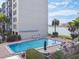 Refreshing community pool with water view at 644 Island Way # 206, Clearwater, FL 33767