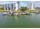 Docks with boats and building view at 644 Island Way # 206, Clearwater, FL 33767