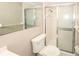 Clean bathroom featuring a shower and updated vanity at 6911 El Camino Paloma St, Port Richey, FL 34668