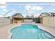 Inviting kidney-shaped pool with a covered patio and bar at 7007 Lambright Ct, Tampa, FL 33634