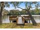 Dock with wooden benches overlooking the water at 906 W Henry Ave, Tampa, FL 33604