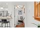 View of stairwell from kitchen featuring wooden trim at 906 W Henry Ave, Tampa, FL 33604