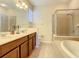 Elegant bathroom with double vanity and large shower at 929 Windton Oak Dr, Ruskin, FL 33570