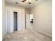 Spacious bedroom with double door closet and neutral carpeting at 929 Windton Oak Dr, Ruskin, FL 33570