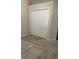 Simple bedroom with double door closet and carpet at 929 Windton Oak Dr, Ruskin, FL 33570