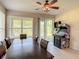 Dining area with table and chairs, and access to backyard patio at 929 Windton Oak Dr, Ruskin, FL 33570