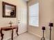 Entryway with a console table and a large mirror at 929 Windton Oak Dr, Ruskin, FL 33570