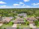 Aerial view of a two-story house with a large backyard in a residential area at 9426 59 N St, Pinellas Park, FL 33782