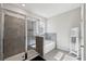 Bathroom featuring a glass shower and separate soaking tub at 9804 Rowing Dale Bnd, Wesley Chapel, FL 33545