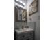 Updated bathroom with a vanity, mirror, and stylish light fixture at 5601 9Th N Ave, St Petersburg, FL 33710