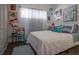 Bright bedroom with a queen-size bed and stylish decor at 5601 9Th N Ave, St Petersburg, FL 33710