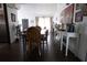 Dining area with a rustic table and chairs, offering a warm and inviting space at 5601 9Th N Ave, St Petersburg, FL 33710