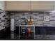 Kitchen counter with coffee mugs and a stylish backsplash at 5601 9Th N Ave, St Petersburg, FL 33710