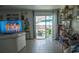 Living room with sliding glass doors leading to a patio at 5601 9Th N Ave, St Petersburg, FL 33710