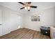 Spacious bedroom with hardwood floors and ceiling fan at 10 N Mercury Ave, Clearwater, FL 33765