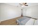 Bright bedroom with wood-look floors and ceiling fan at 10 N Mercury Ave, Clearwater, FL 33765