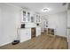 Bright kitchen with white cabinets, quartz countertop and mini fridge at 10 N Mercury Ave, Clearwater, FL 33765