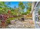 Charming patio with seating area, perfect for relaxing at 10 N Mercury Ave, Clearwater, FL 33765