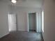 Bright bedroom with neutral walls and carpet flooring at 10008 N 20Th St, Tampa, FL 33612