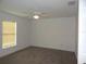 Spacious bedroom with neutral walls and carpet flooring at 10008 N 20Th St, Tampa, FL 33612