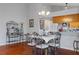 Dining area showcasing elegant furnishings and access to the kitchen at 11121 Sun Tree Rd, Hudson, FL 34667